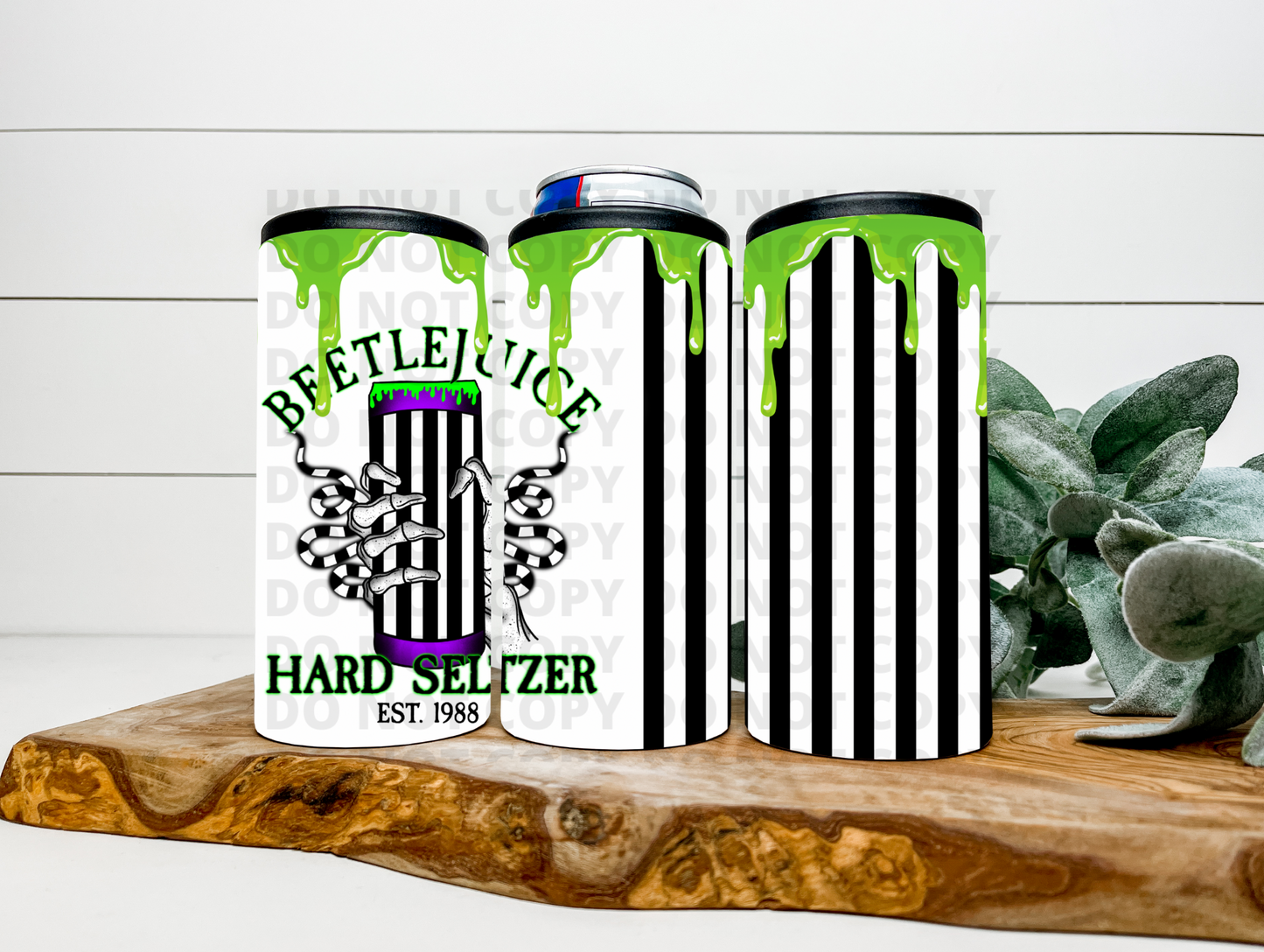 Beetlejuice Hard Seltzer With Black Splatter Can Cooler