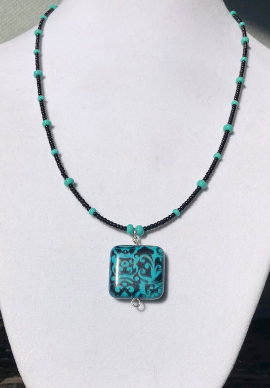 Black & Turquoise Necklace with Floral Pendant
