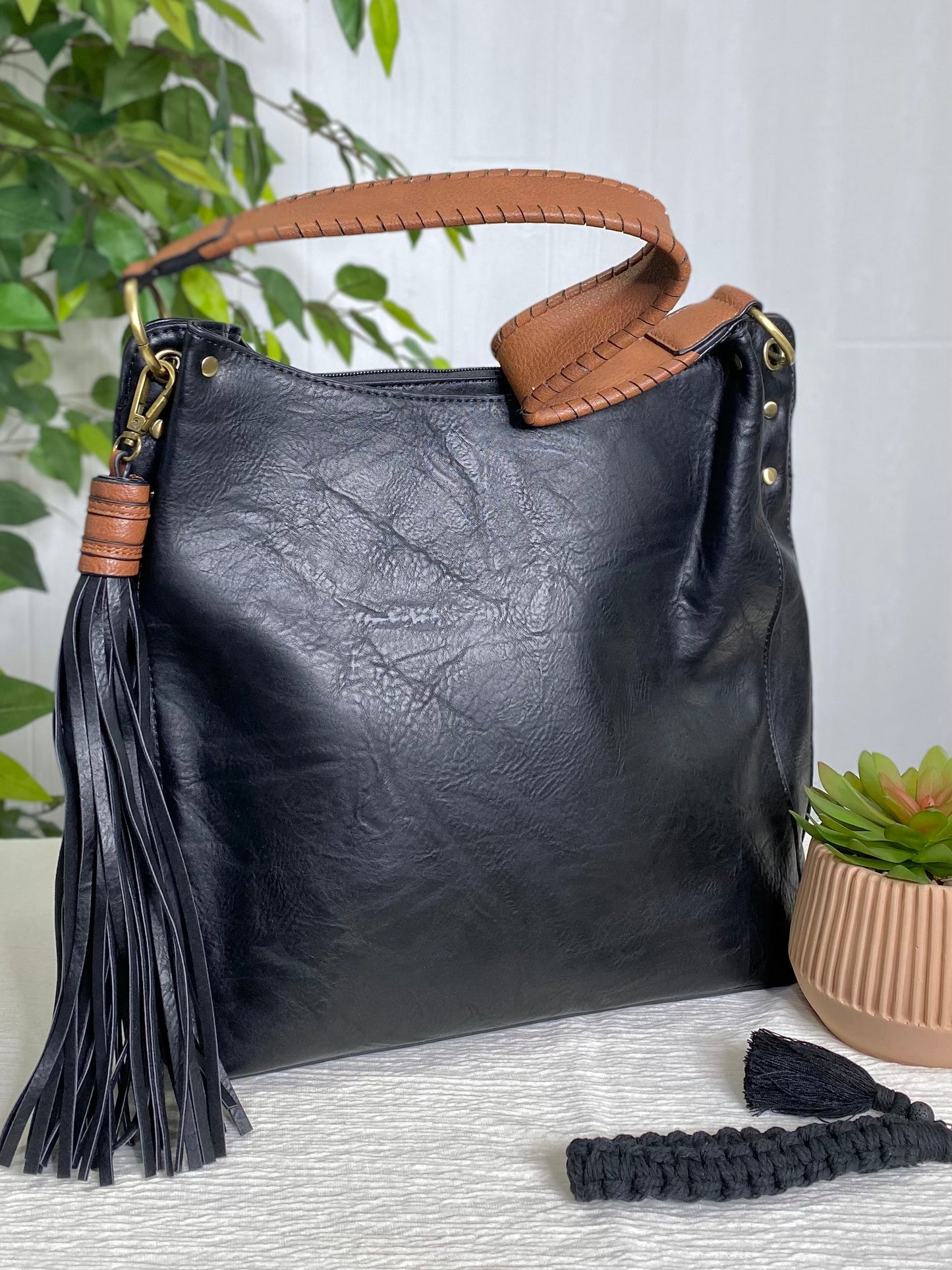 Amber Three Compartment Tassel Hobo Bag in Black