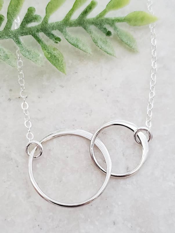 Two Intertwined Circle Sideways Necklace in Sterling Silver